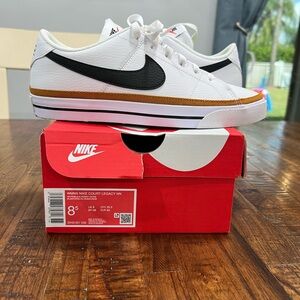 Nike White and Black Court Sneakers with Gold Trim